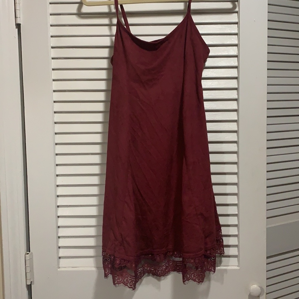 Maroon suede mini dress with lace detailing.